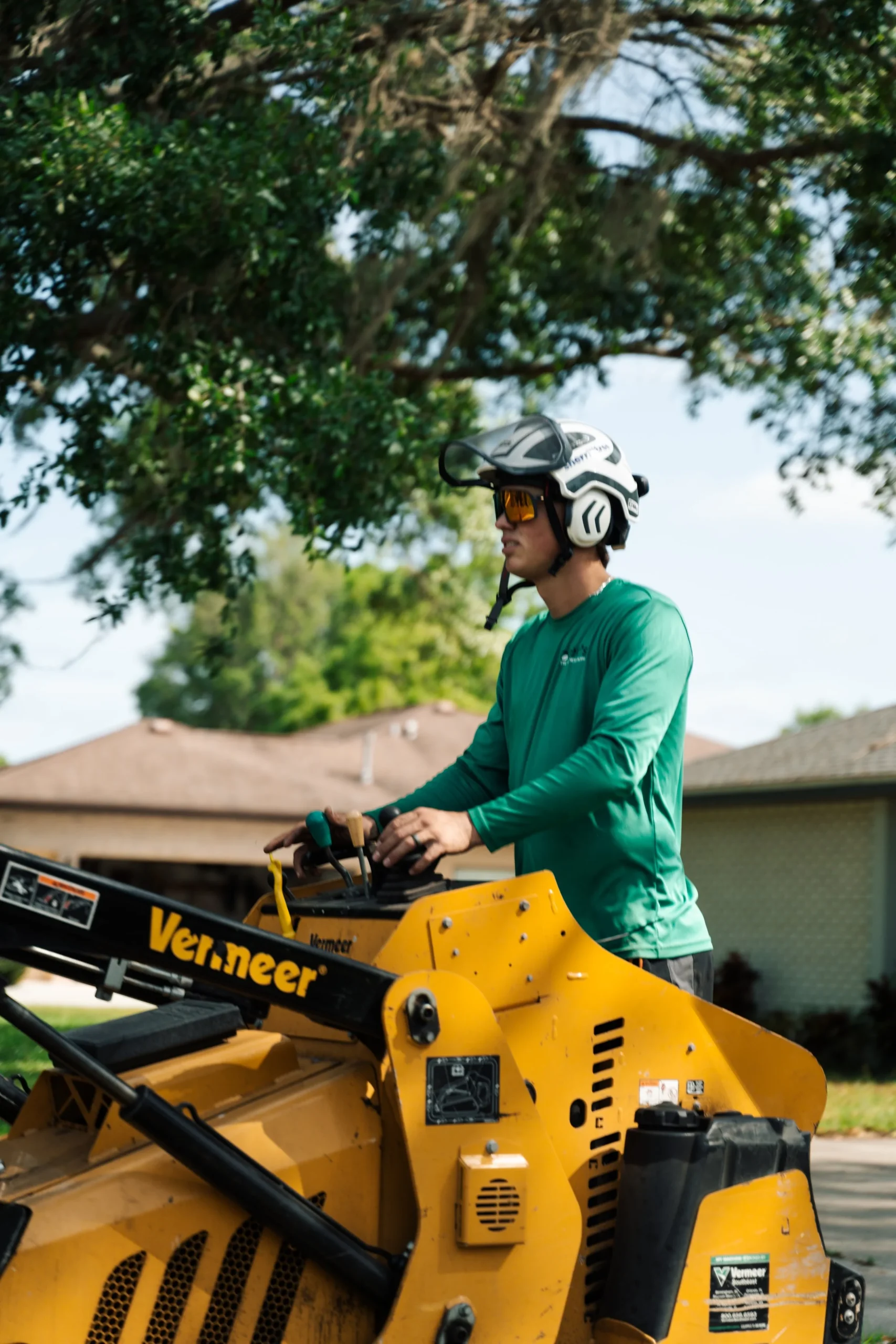 Yoder's Tree and Land Services crew preparing equipment for a tree service job