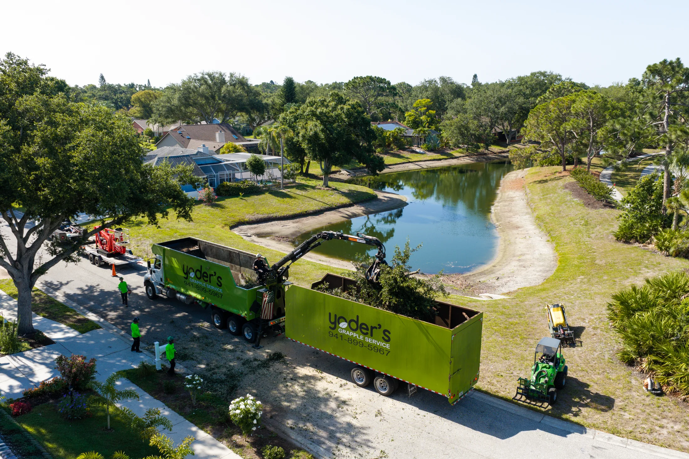 Aerial drone view of tree removal service in Sarasota, FL